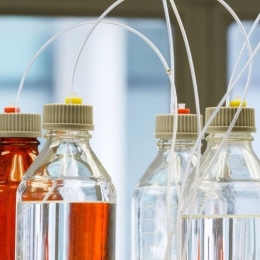 Glass bottles with plastic hose in flavor laboratory